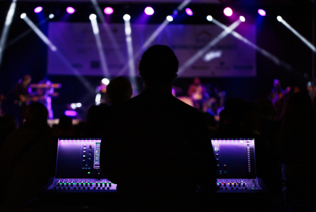 Person standing in front of monitors 